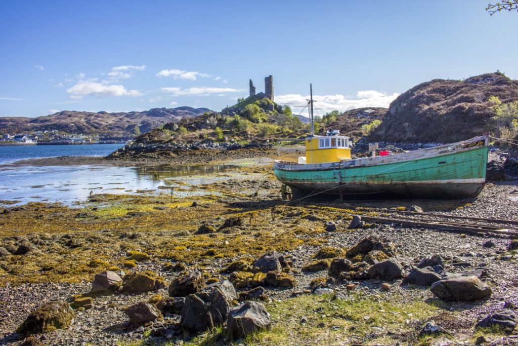 Haggis Adventures Highland Fling Tour Scotland - Isle of Skye ruins and boat