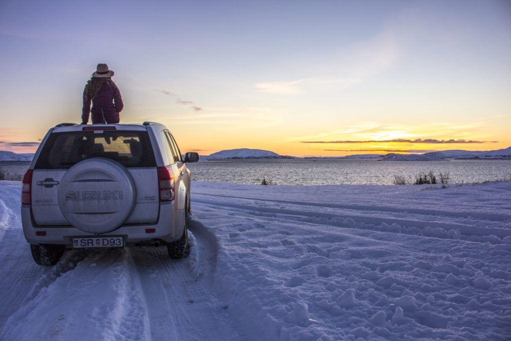Þingvellir National Park car sunrise golden cirlce solo female travel icelend winter roadtrip