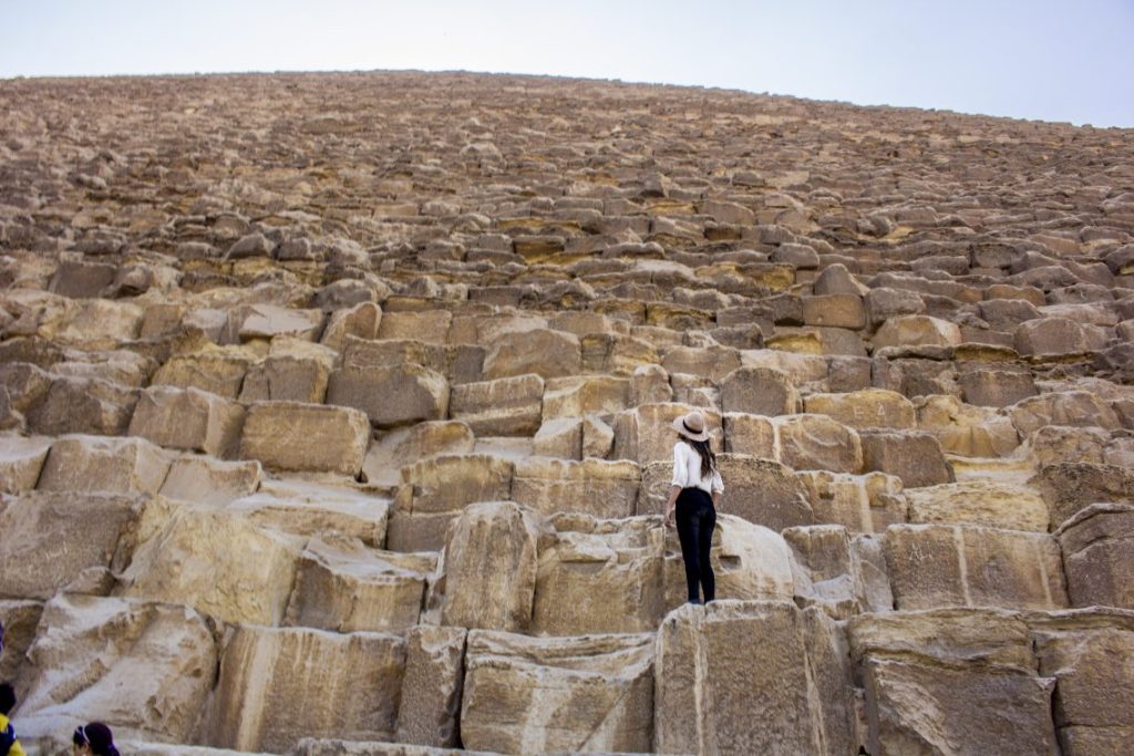 climbing the pyramid of giza - Travel Talk Tours Solo female travel egypt