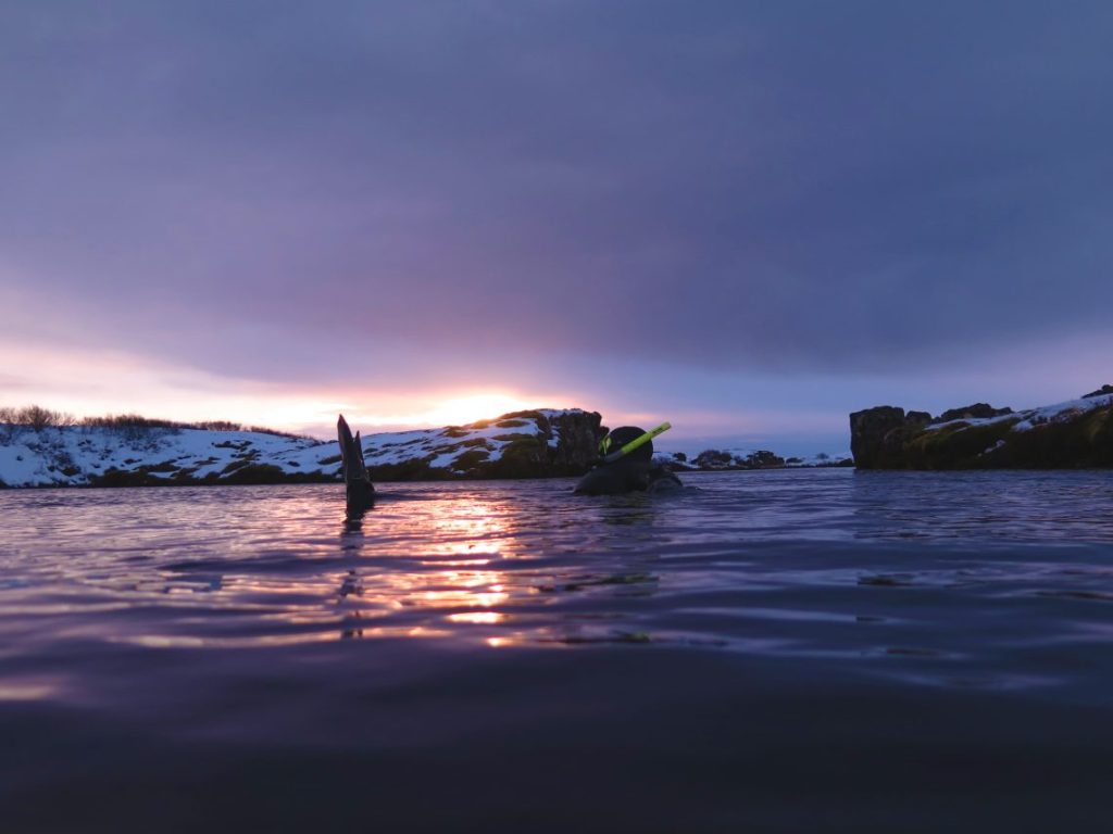 Swimming Between Tectonic Plates floating solo female travel icelend winter roadtrip copy