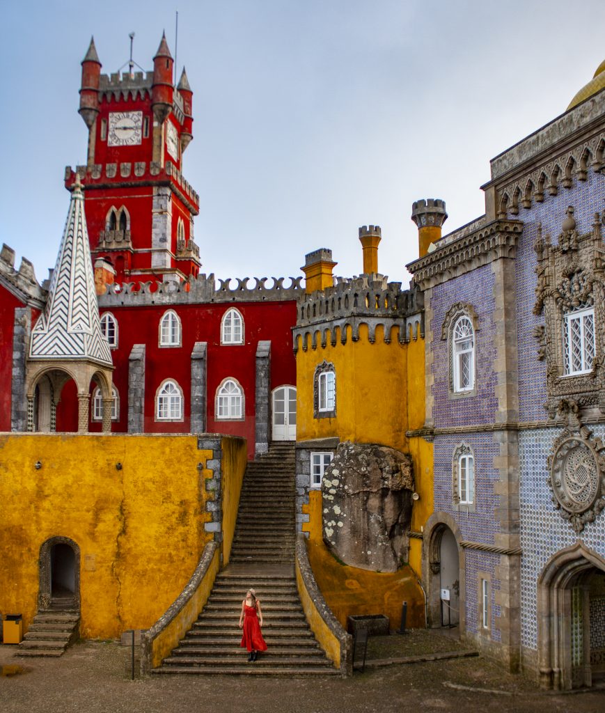 red yellow castle girl red dress pena palace sintra